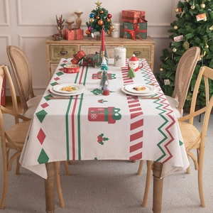 Christmas rectangular tablecloth with festive holiday patterns and decorative fringe