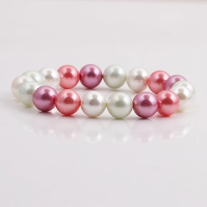 Minimalist shell pearl bracelet set in pink, purple, white, and light green tones