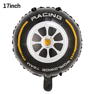 Macro detail of 17-inch black racing tire foil balloon with white Racing typography