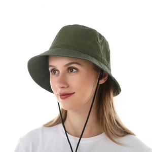 Detail of army green sun hat with adjustable black chin strap for outdoor activities