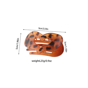 Detailed dimensions of amber heart-shaped hair claw clip with tortoiseshell pattern