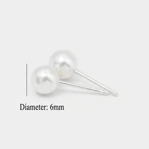 Detailed view of 6mm white round pearl earrings with silver needles for daily wear