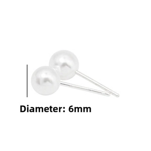 Detailed view of 6mm white round pearl earrings with silver needles for daily wear