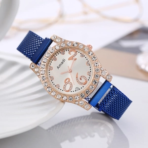 Close-up of a royal blue mesh watch band with magnetic closure and rose gold casing