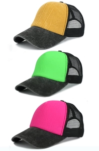 Close-up of distressed cotton baseball caps with breathable mesh back in multiple colors