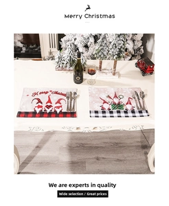 Close-up of Christmas gnome place mat on a festive table with holiday decorations