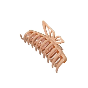 Pink butterfly claw clip with hollow design and glossy finish for women hair styling