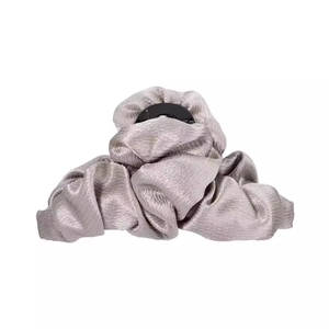 Silver-grey ruched fabric cloud hair claw clip with elegant satin texture on white background