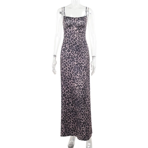Detail of leopard print pattern on a slim fit maxi dress with thin shoulder straps