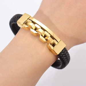 Men's hip hop bracelet featuring black braided leather and golden hollow lock chain links