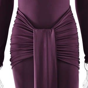 Detailed view of deep purple evening gown featuring side pleats and elegant draped fabric