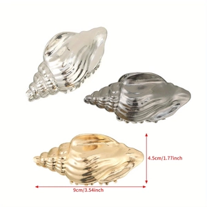 Detailed views of shell hair claws in silver, gold, and gunmetal with size markings