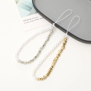 Detailed view of handmade phone straps with white pearls and irregular silver-gold beads