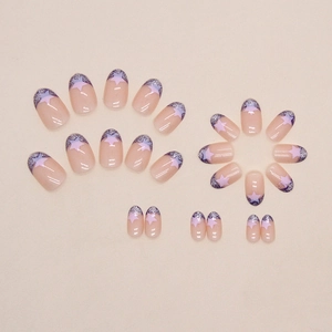 French star press-on nails with purple glitter and oval nude pink glossy finish