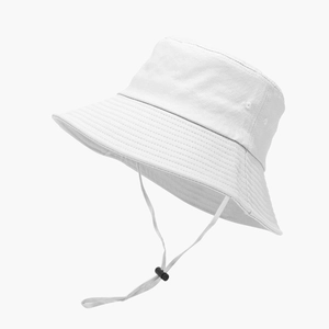 Detail of white bucket hat featuring adjustable chin strap and reinforced brim stitching
