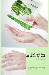 Close-up of ultra-thin transparent aloe vera face mask sheet on hand for hydration