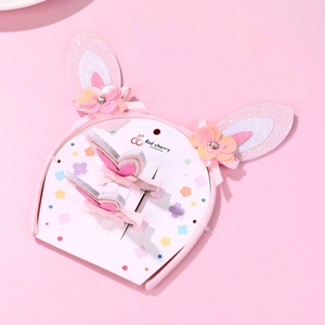 Serre-tête oreilles de lapin à paillettes roses et barrettes avec détails floraux