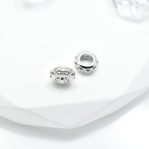 Silver rondelle beads with white cubic zirconia in gold plated copper for DIY jewelry