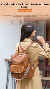 Detail view of brown pebbled leather backpack with decorative woven shoulder strap on model