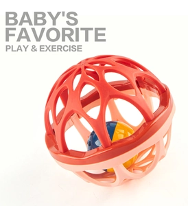 Close-up of a red and pink baby rattle ball with soft silicone cage and colorful inner bell