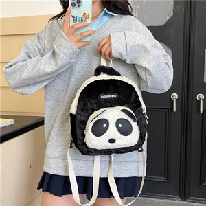 Close-up of cute plush panda backpack showing high-quality embroidery and soft material