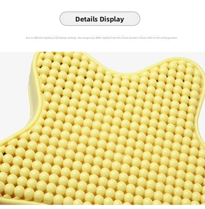 Detailed macro view of yellow star-shaped PVC bag texture with round massage bead surface