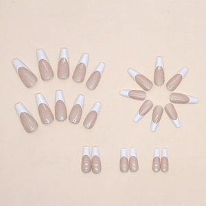 Long ballerina white French tip press-on nails with champagne glitter flakes