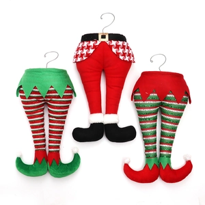 Three plush Christmas elf and Santa legs hanging ornaments with stripes and metal hooks