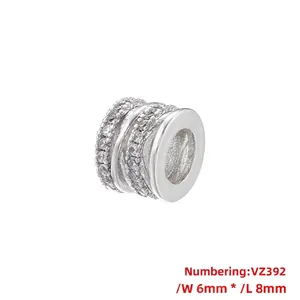 Detailed close-up of VZ392 hollow cross barrel bead with 6mm width and 8mm length size