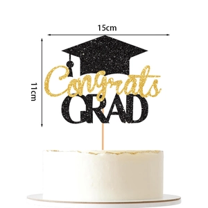 Detail of Congrats GRAD cake topper in black and gold glitter with 15cm width measurement