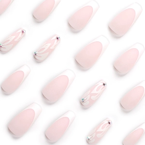 French style white press-on nails in long coffin shape with flame pattern and rhinestones