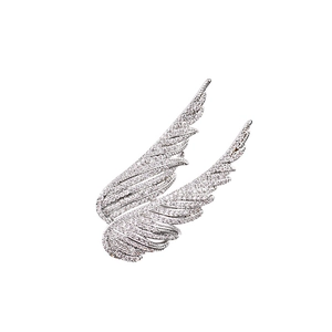 Elegant silver angel wing brooch pin set with shimmering cubic zirconia on white background
