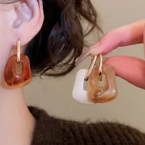 Retro acrylic square drop earrings in marble texture with gold metal hoop closures
