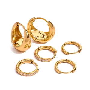 Three pairs of gold stainless steel hoop earrings with smooth and rhinestone finishes