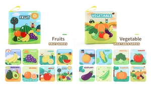 Detail view of colorful English fabric books for babies featuring fruit and vegetable themes