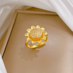 Adjustable golden sunflower ring with sparkling crystals and fine textured petals