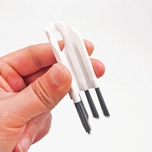 Flexible white gap cleaning brush for bottle caps and lids with curved hanging hook