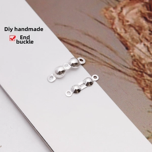 Macro shot of S925 sterling silver bead tips and clamshell endings for DIY jewelry