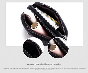 Macro view of dual compartments in black quilted leather coin purse with pebbled texture