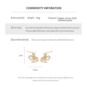 Détails des boucles d'oreilles cheval plaquées or 14 carats avec zircons et perles