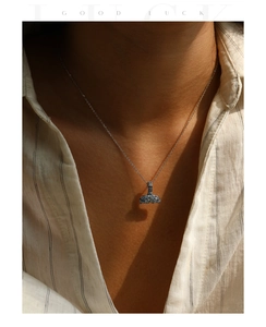 Close-up of S925 sterling silver mermaid tail necklace with blue gradient rhinestones