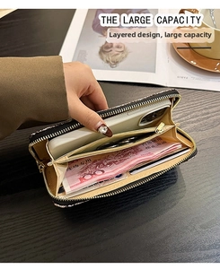 Detailed interior of a large capacity long glitter wallet showing card slots and phone pocket