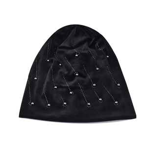 Women's black chenille knit beanie with decorative silver studs and windproof design