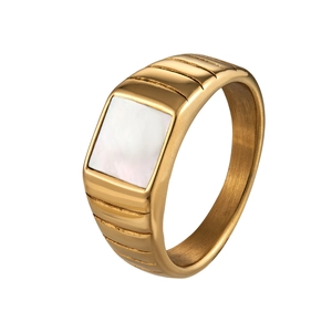 Gold signet ring with white mother of pearl inlay and textured tiered side detailing
