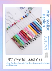 Close-up of DIY plastic beadable pens in various gradient macaron metallic colors