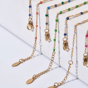 Detail of stainless steel colorful enamel beaded bracelets with lobster clasp and gold chain