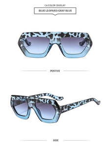Detailansicht der blauen Leopard-Sonnenbrille mit stilvollen graublauen Verlaufsgläsern