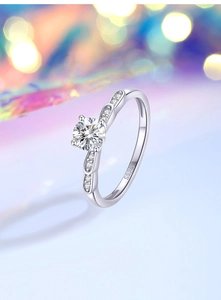 Macro shot of S925 hallmark on the silver band of a moissanite petal ring