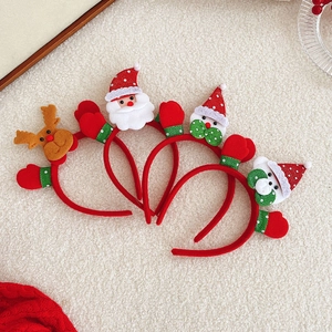 Set of four Christmas headbands with Santa, Snowman, and Reindeer on plush background