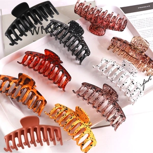 Set of 10 assorted large plastic hair claws with various leopard and matte patterns